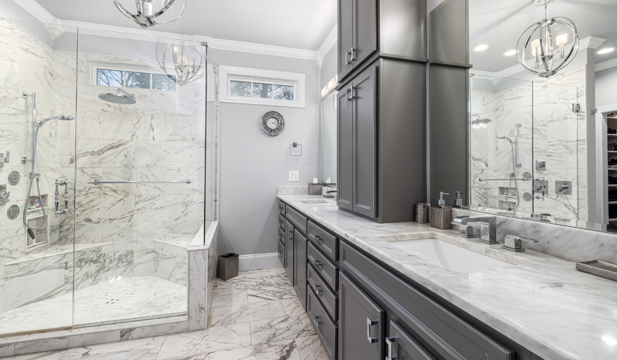 Elegant Classic Bathroom Remodel in El Dorado Hills, CA Classic white bathroom with freestanding tub and marble countertops in El Dorado Hills home