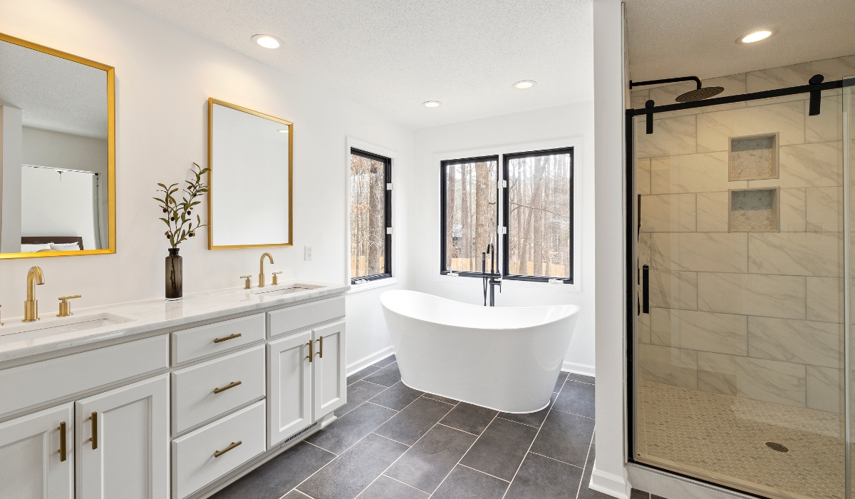 Classic Bathroom Design Details by Remodel California Pedestal sink with vintage lighting and subway tiles in classic bathroom remodel