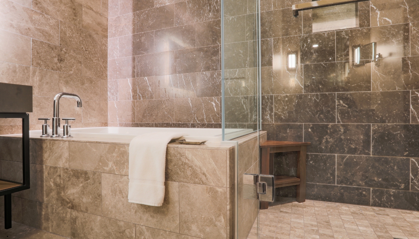 Classic bathroom remodel in California with elegant design, custom tile work, and modern functionality.