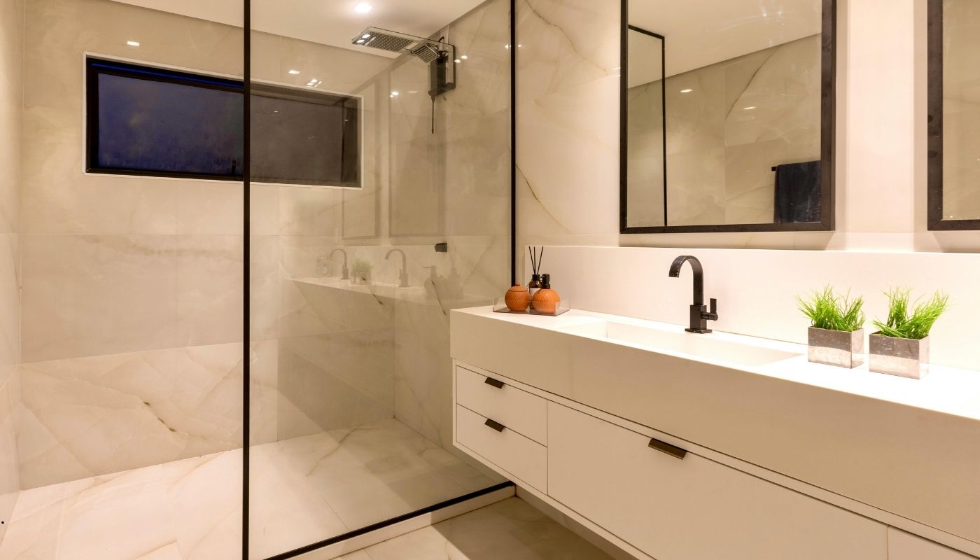 Modern luxury bathroom with freestanding tub, walk-in shower, and elegant fixtures in Folsom, CA, renovated by Remodel California.